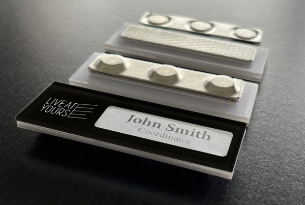 black color reverse-printed clear acrylic insertable name badge